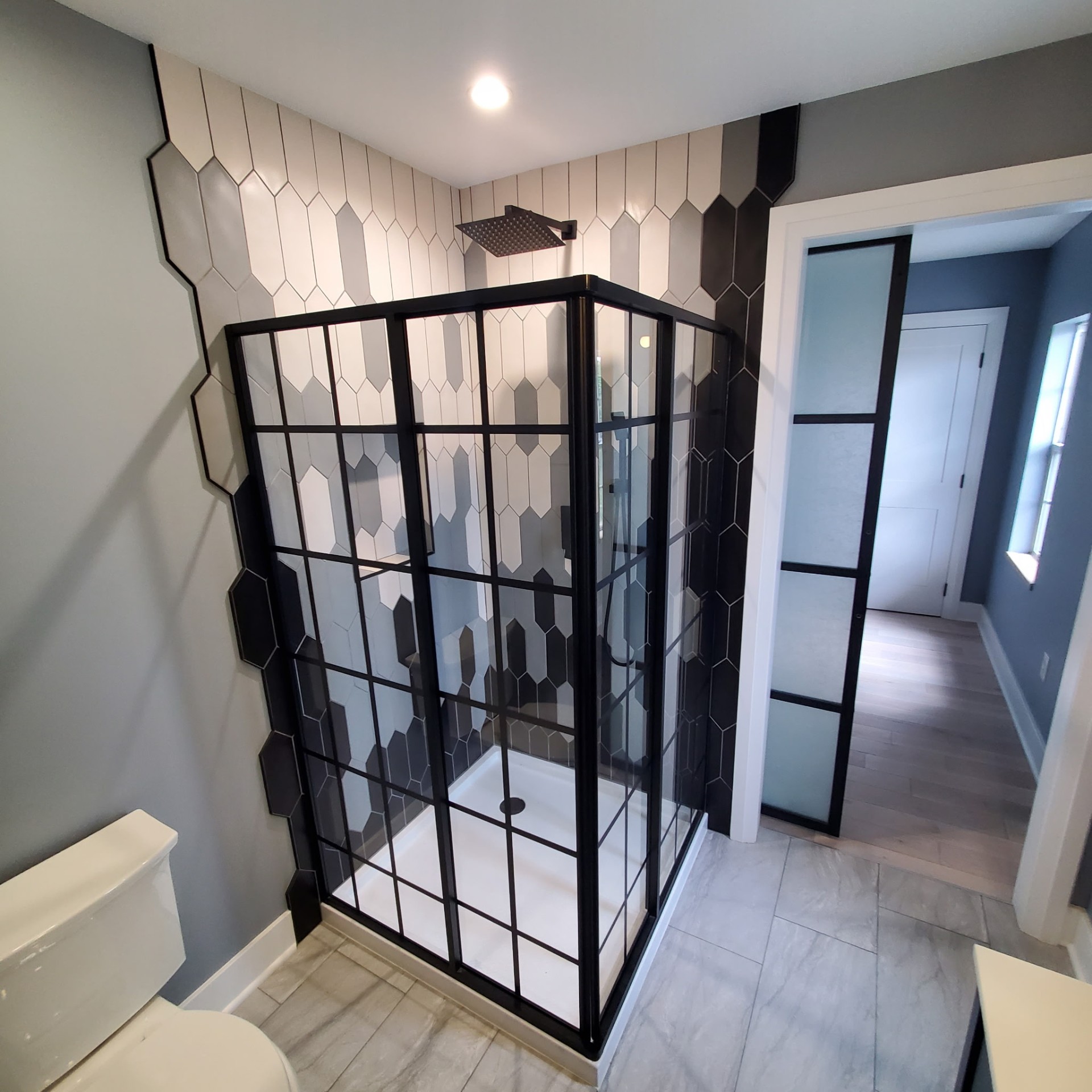 Industrial Glass Shower Enclosure — Bathroom remodel in Bethel Park, PA by Trademark Design